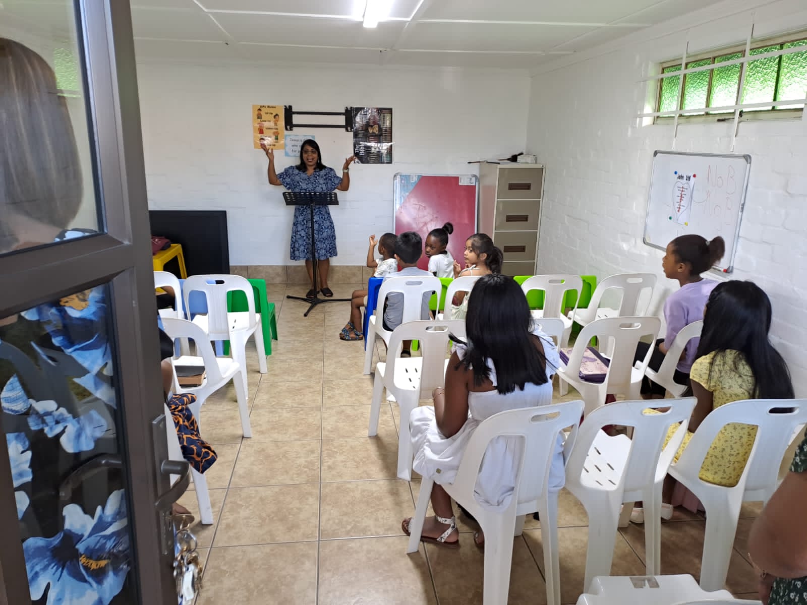 Pearl teaching a Sunday School.